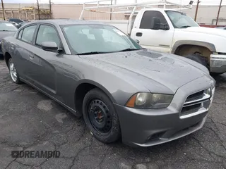 2012 Dodge Charger SXT with VIN 2C3CDXHG1CH278891, listed as a IAAI auction lot 38667338 with 114,099 mi miles. Bid and sale history available at carsss.com. Image 1.