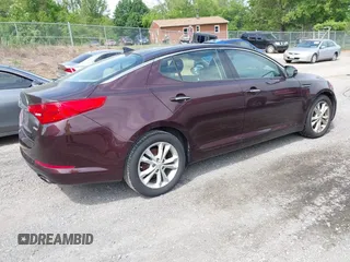 2013 Kia Optima EX with VIN 5XXGN4A70DG147510, listed as a IAAI auction lot 42211671 with 138,947 mi miles and . Bid and sale history available at carsss.com. Image 4.