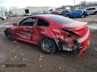 2009 BMW 6 Series 650i with VIN WBAEA53549CV92728, listed as a Copart auction lot 82610144 with 118,803 mi miles and Salvage Title. Bid and sale history available at carsss.com. Image 2.