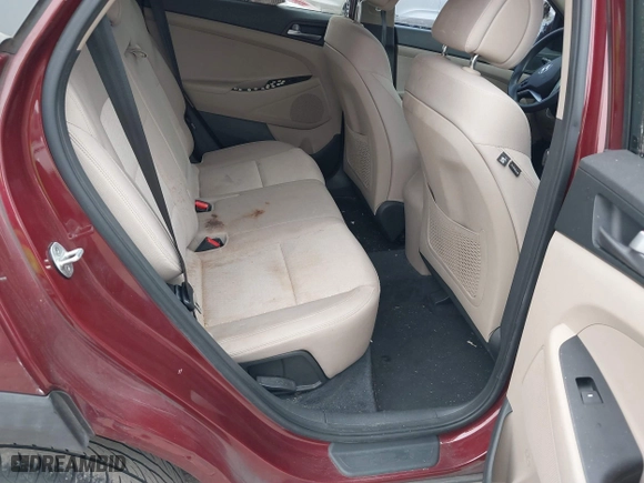 2016 Hyundai Tucson SE with VIN KM8J23A4XGU041915, listed as a IAAI auction lot 41573038 with 101,937 mi miles. Bid and sale history available at carsss.com. Image 8.