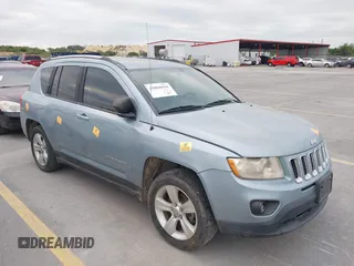 2013 Jeep Compass Sport with VIN 1C4NJCBB9DD116735, listed as a IAAI auction lot 42060594 with 129,272 mi miles. Bid and sale history available at carsss.com. Image 1.