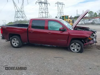 2017 Chevrolet Silverado 1500 LT with VIN 3GCUKREC5HG319937, listed as a IAAI auction lot 42073970 with 99,219 mi miles and . Bid and sale history available at DreamBid. Image 14.