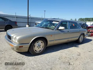 1997 Jaguar XJ with VIN SAJHX6241VC795259, listed as a Copart auction lot 70752854 with Not provided miles and Salvage title. Bid and sale history available at DreamBid. Image 1.