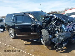2017 GMC Yukon Denali with VIN 1GKS2CKJ0HR185365, listed as a IAAI auction lot 41856187 with 107,641 mi miles. Bid and sale history available at carsss.com. Image 12.