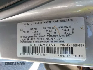 2012 Mazda 3 i Sport with VIN JM1BL1UG4C1519242, listed as a IAAI auction lot 41827606 with 142,831 mi miles and . Bid and sale history available at DreamBid. Image 9.