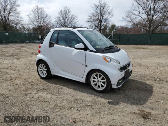 2013 Smart fortwo Passion z VIN WMEEK3BA6DK640099, wystawiony jako Copart lot #50757045 z przebiegiem 102 129 mil mil oraz Czysty tytuł • Clean title. Historia ofert i sprzedaży dostępna na DreamBid. Obrazek 4.