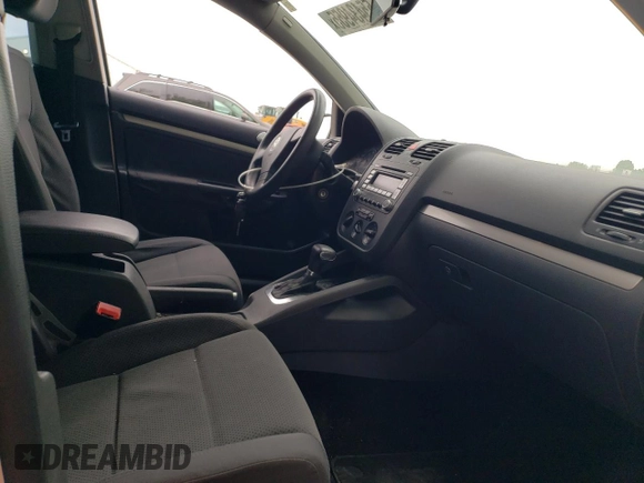 2009 Volkswagen Rabbit S с VIN WVWDA71K49W079965, выставлен на аукционе Copart как лот 55434955 с пробегом 140 529 миль миль и Списание • Salvage title. История ставок и продаж доступна на DreamBid. Изображение 7.
