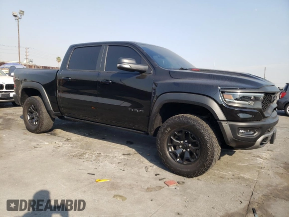 2022 Ram 1500 TRX with VIN 1C6SRFU98NN171865, listed as a Copart auction lot 87884115 with 12,015 mi miles and Clean title. Bid and sale history available at DreamBid. Image 4.