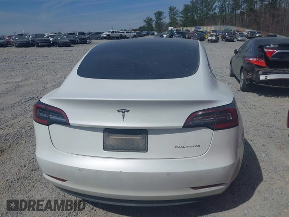2022 Tesla Model 3 Long Range with VIN 5YJ3E1EB0NF106570, listed as a IAAI auction lot 41832622 with 52,679 mi miles and . Bid and sale history available at DreamBid. Image 16.