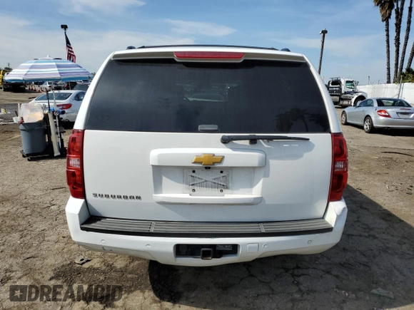 2014 Chevrolet Suburban LT with VIN 1GNSCJE00ER209005, listed as a Copart auction lot 45729745 with 129,662 mi miles and Salvage Title. Bid and sale history available at carsss.com. Image 6.