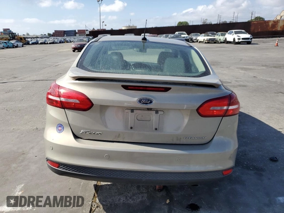 2015 Ford Focus Titanium с VIN 1FADP3J28FL288037, выставлен на аукционе Copart как лот 56972865 с пробегом 75 703 миль миль и Списание • Salvage title. История ставок и продаж доступна на DreamBid. Изображение 6.