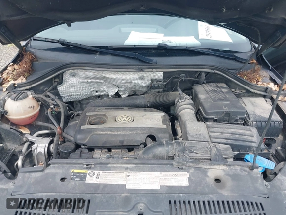 2013 Volkswagen Tiguan S with VIN WVGBV3AX7DW611410, listed as a IAAI auction lot 42549561 with 115,855 mi miles and . Bid and sale history available at DreamBid. Image 10.