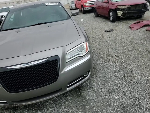2014 Chrysler 300 with VIN 2C3CCAAG0EH203709, listed as a Copart auction lot 50055075 with 161,043 mi miles and Salvage Title. Bid and sale history available at carsss.com. Image 13.