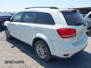 2013 Dodge Journey SXT with VIN 3C4PDCBG0DT701712, listed as a IAAI auction lot 42015263 with 92,533 mi miles. Bid and sale history available at carsss.com. Image 3.