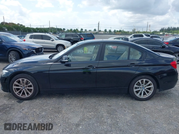 2018 BMW 3 Series 320i with VIN WBA8E1G57JNU88781, listed as a IAAI auction lot 42019246 with 56,820 mi miles. Bid and sale history available at carsss.com. Image 15.