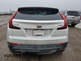 2021 Cadillac XT4 FWD Luxury z VIN 1GYAZAR48MF018135, wystawiony jako Copart lot #43023665 z przebiegiem 54 271 mil mil oraz Szkoda całkowita • Salvage title. Historia ofert i sprzedaży dostępna na DreamBid. Obrazek 6.