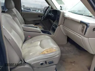 2004 GMC Yukon SLT with VIN 1GKEK13Z74R114583, listed as a IAAI auction lot 41834400 with 311,567 mi miles. Bid and sale history available at carsss.com. Image 5.