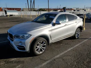 2016 BMW X6 sDrive35i with VIN 5UXKU0C59G0F93390, listed as a Copart auction lot 80156444 with 69,196 mi miles and Salvage Title. Bid and sale history available at carsss.com. Image 1.