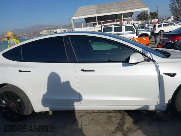 2023 Tesla Model 3 with VIN 5YJ3E1EA0PF503352, listed as a IAAI auction lot 41718658 with 28,426 mi miles and . Bid and sale history available at DreamBid. Image 13.