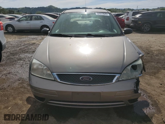 2005 Ford Focus S with VIN 1FAFP34NX5W263944, listed as a Copart auction lot 52973945 with 201,348 mi miles and Salvage Title. Bid and sale history available at carsss.com. Image 5.