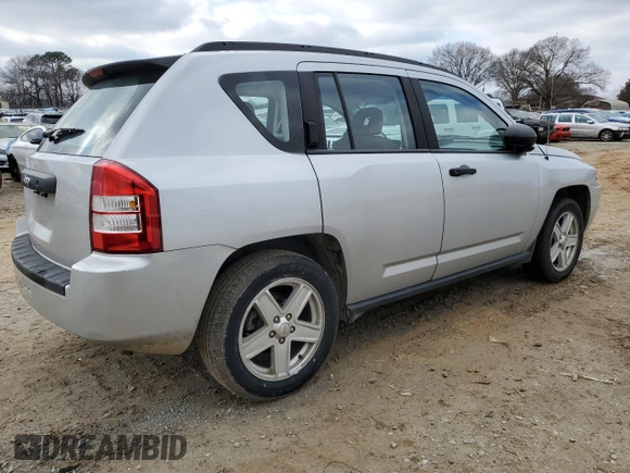 2007 Jeep Compass Sport with VIN 1J8FT47W87D211137, listed as a Copart auction lot 45294835 with 144,156 mi miles and Salvage Title. Bid and sale history available at carsss.com. Image 3.
