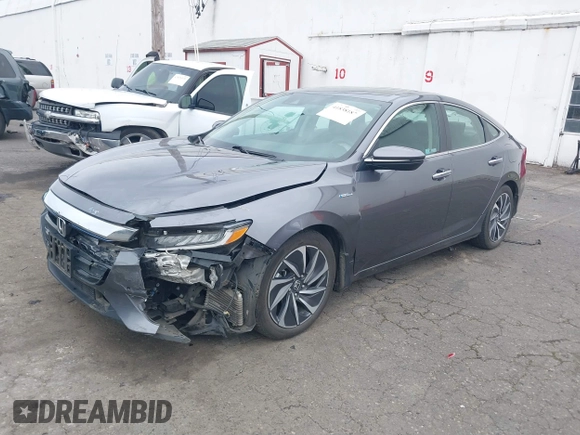 2019 Honda Insight Touring with VIN 19XZE4F90KE020510, listed as a IAAI auction lot 41838187 with 88,649 mi miles and . Bid and sale history available at DreamBid. Image 2.