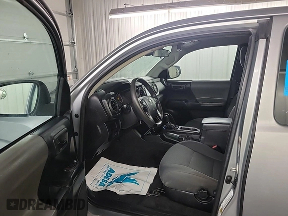 2018 Toyota Tacoma SR with VIN 5TFSX5EN6JX062775, listed as a IAAI auction lot 42774090 with 146,583 mi miles and . Bid and sale history available at DreamBid. Image 44.