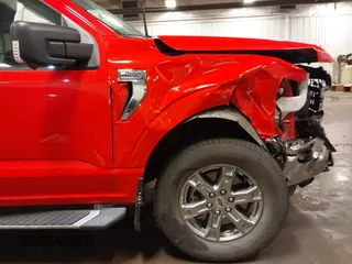 2023 Ford F-150 XL z VIN 1FTFW1E89PKD85604, wystawiony jako IAAI lot #42573035 z przebiegiem 29 531 mil mil oraz . Historia ofert i sprzedaży dostępna na DreamBid. Obrazek 19.