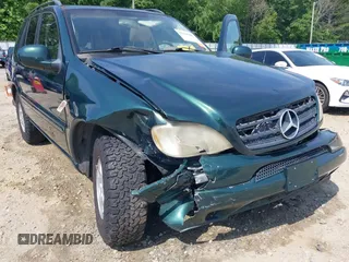 2000 Mercedes-Benz M 320/430/500 z VIN 4JGAB54E9YA180890, wystawiony jako IAAI lot #42151065 z przebiegiem 98 866 mil mil oraz . Historia ofert i sprzedaży dostępna na DreamBid. Obrazek 6.