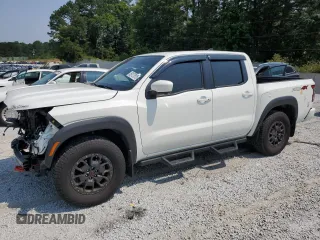 2022 Nissan Frontier SV with VIN 1N6ED1EKXNN693824, listed as a Copart auction lot 59127815 with 28,033 mi miles and Salvage title. Bid and sale history available at DreamBid. Image 1.