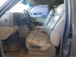 2001 GMC Yukon SLT z VIN 1GKEK13T21J165558, wystawiony jako Copart lot #52200565 z przebiegiem 291 699 mil mil oraz Szkoda całkowita • Salvage title. Historia ofert i sprzedaży dostępna na DreamBid. Obrazek 7.
