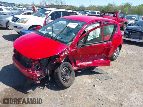 2012 Toyota Yaris L with VIN JTDKTUD32CD536389, listed as a IAAI auction lot 42020928 with 138,379 mi miles. Bid and sale history available at carsss.com. Image 2.