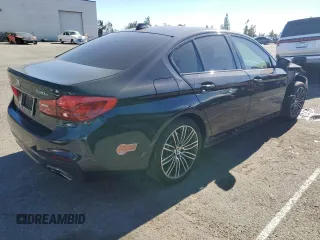 2020 BMW 5 Series 530e with VIN WBAJA9C00LCD60874, listed as a Copart auction lot 87960825 with 91,036 mi miles and Salvage Title. Bid and sale history available at DreamBid. Image 3.