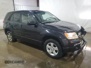 2011 Suzuki Grand Vitara Premium with VIN JS3TD0D28B4102673, listed as a Copart auction lot 43216005 with 141,726 mi miles and Salvage title. Bid and sale history available at DreamBid. Image 4.