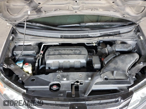 2014 Honda Odyssey Touring with VIN 5FNRL5H99EB111525, listed as a Copart auction lot 61986005 with 137,905 mi miles and Salvage title. Bid and sale history available at DreamBid. Image 12.