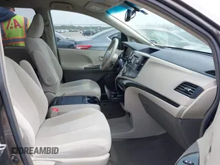 2013 Toyota Sienna LE AAS with VIN 5TDKK3DC1DS392577, listed as a IAAI auction lot 41932168 with 90,643 mi miles and . Bid and sale history available at DreamBid. Image 5.