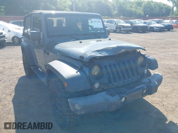 2015 Jeep Wrangler Freedom Edition with VIN 1C4AJWAG1FL714002, listed as a IAAI auction lot 42579024 with 98,732 mi miles and . Bid and sale history available at DreamBid. Image 17.