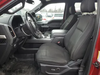 2015 Ford F-150 XLT w/HD Payload Pkg with VIN 1FTFW1EG9FFA35744, listed as a Copart auction lot 51133275 with 128,006 mi miles and Salvage Title. Bid and sale history available at carsss.com. Image 7.