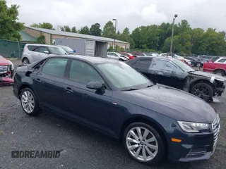 2018 Audi A4 Premium with VIN WAUKMAF46JN010241, listed as a IAAI auction lot 40223223 with 55,120 mi miles. Bid and sale history available at carsss.com. Image 1.