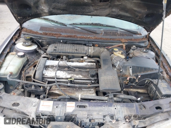 1995 Ford Contour z VIN 3FALP6633SM116313, wystawiony jako IAAI lot #42058920 z przebiegiem 192 905 mil mil oraz . Historia ofert i sprzedaży dostępna na DreamBid. Obrazek 10.