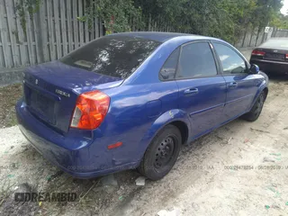 2006 Suzuki Forenza z VIN KL5JD56Z96K360480, wystawiony jako IAAI lot #25478254 z przebiegiem 227 745 mil mil oraz . Historia ofert i sprzedaży dostępna na DreamBid. Obrazek 4.