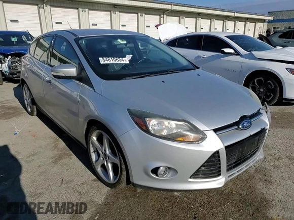 2014 Ford Focus Titanium z VIN 1FADP3N2XEL263357, wystawiony jako Copart lot #84610634 z przebiegiem 142 023 mil mil oraz Nie do naprawy • Non repairable. Historia ofert i sprzedaży dostępna na DreamBid. Obrazek 12.