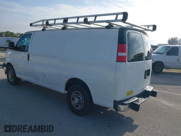 2019 Chevrolet Express Cargo Van with VIN 1GCWGAFG5K1254736, listed as a IAAI auction lot 41880050 with 136,132 mi miles. Bid and sale history available at carsss.com. Image 3.