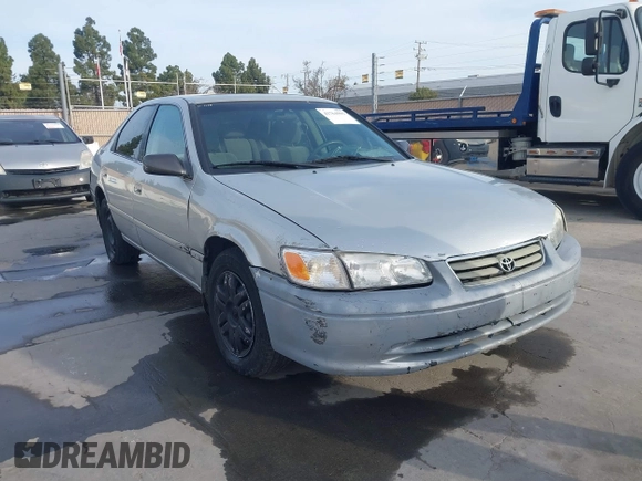 2001 Toyota Camry CE with VIN 4T1BG22KX1U867930, listed as a IAAI auction lot 41764995 with 216,679 mi miles. Bid and sale history available at carsss.com. Image 1.