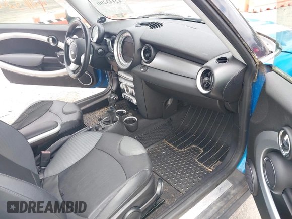 2010 MINI Hardtop S with VIN WMWMF7C55ATW88946, listed as a IAAI auction lot 42443200 with 104,953 mi miles and . Bid and sale history available at DreamBid. Image 5.