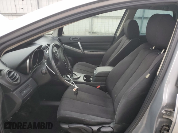 2012 Mazda CX-7 i Sport z VIN JM3ER2B53C0416250, wystawiony jako Copart lot #47869625 z przebiegiem 145 067 mil mil oraz Szkoda całkowita • Salvage title. Historia ofert i sprzedaży dostępna na DreamBid. Obrazek 7.