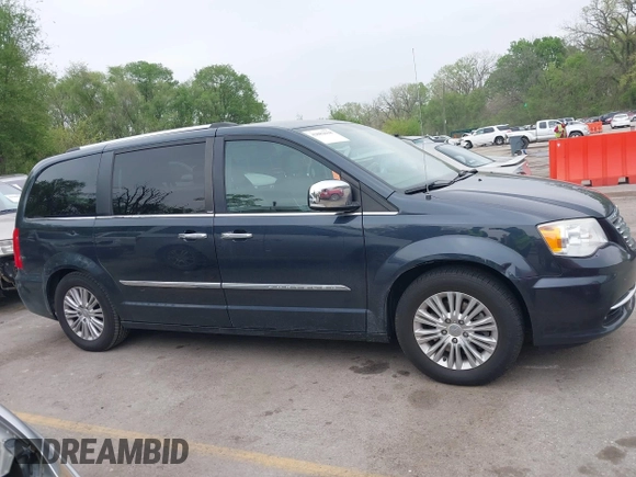 2014 Chrysler Town & Country Limited with VIN 2C4RC1GG3ER188114, listed as a IAAI auction lot 42082618 with 193,562 mi miles and . Bid and sale history available at DreamBid. Image 13.