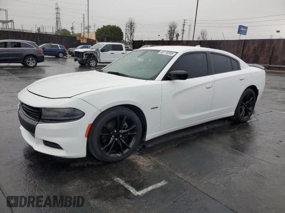 2016 Dodge Charger R/T with VIN 2C3CDXCT9GH228721, listed as a Copart auction lot 48770395 with 142,877 mi miles and Salvage Title. Bid and sale history available at carsss.com. Image 1.