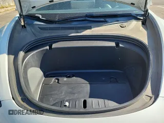 2020 Tesla Model 3 Long Range with VIN 5YJ3E1EB7LF637357, listed as a IAAI auction lot 42184528 with 89,909 mi miles. Bid and sale history available at carsss.com. Image 1.