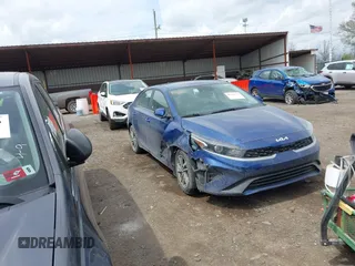 2024 Kia Forte LXS with VIN 3KPF24AD8RE735701, listed as a IAAI auction lot 42080715 with 21,401 mi miles and . Bid and sale history available at DreamBid. Image 1.